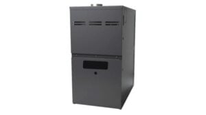 Furnace unit being inspected for whistling noise and airflow issues in Portland, OR